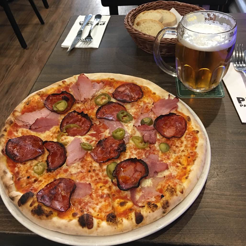 This pizza and beer cost less than $5. I love Prague!